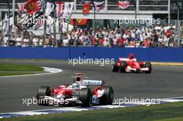 10.07.2005 Silverstone, England, Jarno Trulli (ITA), Panasonic Toyota Racing TF105, leads Michael Schumacher (GER), Scuderia Ferrari Marlboro F2005 - July, Formula 1 World Championship, Rd 11, British Grand Prix, Silverstone, England, Race