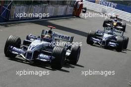 10.07.2005 Silverstone, England, Mark Webber, AUS, BMW WilliamsF1 Team, FW27, Action, Track driving into Parc Ferme - July, Formula 1 World Championship, Rd 11, British Grand Prix, Silverstone, England, Race