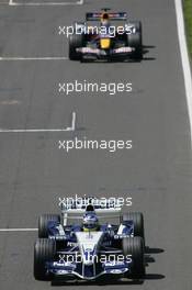 10.07.2005 Silverstone, England, Nick Heidfeld, GER, BMW WilliamsF1 Team, Christian Klien, AUT, Red Bull Racing - July, Formula 1 World Championship, Rd 11, British Grand Prix, Silverstone, England, Race
