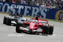 10.07.2005 Silverstone, England, Rubens Barrichello, BRA, Scuderia Ferrari Marlboro, F2005, Action, Track leads Christijan Albers, NED, Minardi Cosworth, Action, Track - July, Formula 1 World Championship, Rd 11, British Grand Prix, Silverstone, England, Race