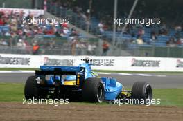 09.07.2005 Silverstone, England, Giancarlo Fisichella (ITA), Mild Seven Renault F1 R25, spinning on the track - July, Formula 1 World Championship, Rd 11, British Grand Prix, Silverstone, England, Practice