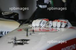 09.07.2005 Silverstone, England, hand cuff of Takuma Sato, JPN,  BAR Honda - July, Formula 1 World Championship, Rd 11, British Grand Prix, Silverstone, England