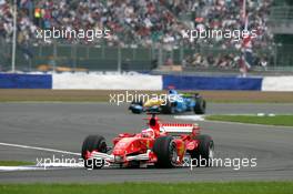 09.07.2005 Silverstone, England, Rubens Barrichello (BRA), Scuderia Ferrari Marlboro F2005, in front of Fernando Alonso (ESP), Mild Seven Renault F1 R25 - July, Formula 1 World Championship, Rd 11, British Grand Prix, Silverstone, England, Practice