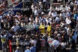 10.07.2005 Silverstone, England, Grid - Minute of silence - July, Formula 1 World Championship, Rd 11, British Grand Prix, Silverstone, England