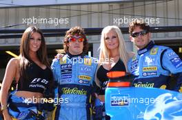 10.07.2005 Silverstone, England, Fernando Alonso, ESP, Renault F1 Team and Giancarlo Fisichella, ITA, Mild Seven Renault F1 Team with the Playstation Girls, Lucy Pinder and Michelle Marsh (blond)  - July, Formula 1 World Championship, Rd 11, British Grand Prix, Silverstone, England