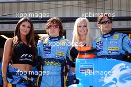 10.07.2005 Silverstone, England, Fernando Alonso, ESP, Renault F1 Team and Giancarlo Fisichella, ITA, Mild Seven Renault F1 Team with the Playstation Girls, Lucy Pinder and Michelle Marsh (blond)  - July, Formula 1 World Championship, Rd 11, British Grand Prix, Silverstone, England