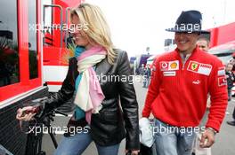 07.07.2005 Silverstone, England Michael Schumacher, GER, Ferrari arrived in the Paddock Area and Corina Schumacher, GER, Corinna, wife of Michael Schumacher - July, Formula 1 World Championship, Rd 11, British Grand Prix, Silverstone, England