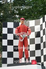 22.07.2005 Hockenheim, Germany, Fan feature, Michael Schumacher dummy on a podium sprays with "Champaign" - July, Formula 1 World Championship, Rd 12, German Grand Prix, Hockenheim, Germany, Grosser Mobil 1 Preis von Deutschland, GER, Hockenheimring Baden-Württemberg