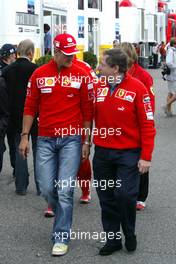 22.07.2005 Hockenheim, Germany, Michael Schumacher, GER, Ferrari chats with Jean Todt, FRA, Ferrari, Teamchief, General Manager, GES - July, Formula 1 World Championship, Rd 12, German Grand Prix, Hockenheim, Germany, Grosser Mobil 1 Preis von Deutschland, GER, Hockenheimring Baden-Württemberg