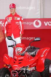 21.07.2005 Hockenheim, Germany, Vodafone Event at Hockenheim Talhaus, Michael Schumacher, GER, Ferrari and Rubens Barrichello, BRA, Ferrari driving on a Quad-Bike to make paintings on a big canvas for Charity - July, Formula 1 World Championship, Rd 12, German Grand Prix, Hockenheim, Germany, Grosser Mobil 1 Preis von Deutschland, GER, Hockenheimring Baden-Württemberg