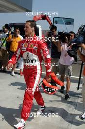29.07.2005 Hungaroring, Hungary, Michael Schumacher, GER, Ferrari, returns to pitlane after he had to stop his car on track - July, Formula 1 World Championship, Rd 13, Hungarian Grand Prix, Budapest, Hungary, HUN, Practice