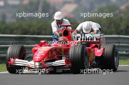 29.07.2005 Hungaroring, Hungary, Michael Schumacher, GER, Ferrari stopped on the track  - July, Formula 1 World Championship, Rd 13, Hungarian Grand Prix, Budapest, Hungary, HUN, Practice