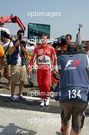 29.07.2005 Hungaroring, Hungary, Michael Schumacher, GER, Ferrari, returns to pitlane after he had to stop the Ferrari on track - July, Formula 1 World Championship, Rd 13, Hungarian Grand Prix, Budapest, Hungary, HUN, Practice