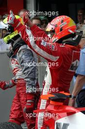 31.07.2005 Hungaroring, Hungary, Michael Schumacher, GER, Ferrari, and Ralf Schumacher, GER, Panasonic Toyota Racing - July, Formula 1 World Championship, Rd 13, Hungarian Grand Prix, Budapest, Hungary, HUN, Podium