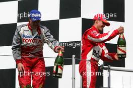 31.07.2005 Hungaroring, Hungary, Ralf Schumacher (GER), Panasonic Toyota Racing, Portrait (3rd, left) and Michael Schumacher (GER), Scuderia Ferrari Marlboro, Portrait (2nd, right) - July, Formula 1 World Championship, Rd 13, Hungarian Grand Prix, Budapest, Hungary, HUN, Podium