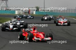 31.07.2005 Hungaroring, Hungary, Start of the race, with Michael Schumacher (GER), Scuderia Ferrari Marlboro F2005, leading the field - July, Formula 1 World Championship, Rd 13, Hungarian Grand Prix, Budapest, Hungary, HUN, Race