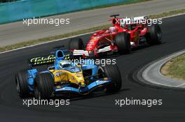 31.07.2005 Hungaroring, Hungary, Giancarlo Fisichella (ITA), Mild Seven Renault F1 R25, leads Rubens Barrichello (BRA), Scuderia Ferrari Marlboro F2005 - July, Formula 1 World Championship, Rd 13, Hungarian Grand Prix, Budapest, Hungary, HUN, Race
