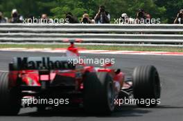 30.07.2005 Hungaroring, Hungary, Photographers taking a picture of Michael Schumacher (GER), Scuderia Ferrari Marlboro F2005 - July, Formula 1 World Championship, Rd 13, Hungarian Grand Prix, Budapest, Hungary, HUN, Practice