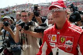 30.07.2005 Hungaroring, Hungary, Michael Schumacher, GER, Ferrari, surrounded by photographers - July, Formula 1 World Championship, Rd 13, Hungarian Grand Prix, Budapest, Hungary, HUN, Qualifying