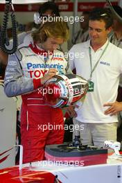 30.07.2005 Hungaroring, Hungary, Jarno Trulli (ITA), Panasonic Toyota Racing, Portrait, preparing the visors on his helmet - July, Formula 1 World Championship, Rd 13, Hungarian Grand Prix, Budapest, Hungary, HUN, Practice