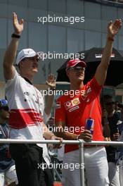 31.07.2005 Hungaroring, Hungary, Ralf Schumacher, GER, Panasonic Toyota Racing and Michael Schumacher, GER, Ferrari - July, Formula 1 World Championship, Rd 13, Hungarian Grand Prix, Budapest, Hungary, HUN