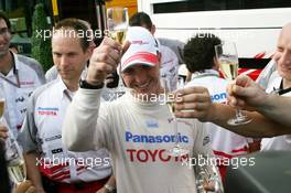 31.07.2005 Hungaroring, Hungary, Ralf Schumacher, GER, Panasonic Toyota Racing, celebrating his 3rd position with champagne - July, Formula 1 World Championship, Rd 13, Hungarian Grand Prix, Budapest, Hungary, HUN