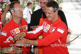 28.07.2005 Hungaroring, Hungary, Rubens Barrichello, BRA, Ferrari not so happy with Michael Schumacher's cooking at a Vonefone Event - Intercontinental Hotel, July, Formula 1 World Championship, Rd 13, Hungarian Grand Prix, Budapest, Hungary, HUN