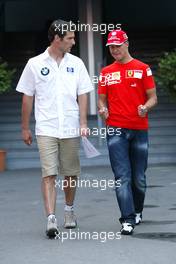 02.09.2005 Monza, Italy, Michael Schumacher, GER, Ferrari, Mark Webber, AUS, BMW WilliamsF1 Team - September, Formula 1 World Championship, Rd 15, Italian Grand Prix