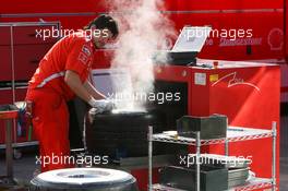 13.12.2005 Jerez, Spain,  Ferrari wash tyres in the paddock - Formula One Testing, Jerez de la Frontera