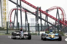 07.10.2005 Suzuka, Japan,  Giancarlo Fisichella, ITA, Mild Seven Renault F1 Team, R25, Action, Track  leads Robert Doornbos, NED, Minardi Cosworth, Action, Track - October, Formula 1 World Championship, Rd 18, Japanese Grand Prix, Friday Practice