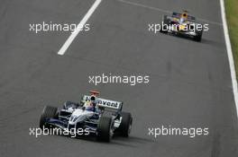 09.10.2005 Suzuka, Japan,  Mark Webber, AUS, BMW WilliamsF1 Team, FW27, Action, Track leads Christian Klien, AUT, Red Bull Racing, RB1, Action, Track - October, Formula 1 World Championship, Rd 18, Japanese Grand Prix, Sunday Race