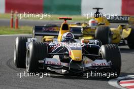 09.10.2005 Suzuka, Japan,  David Coulthard, GBR, Red Bull Racing, RB1, Action, Track leads Narain Karthikeyan, IND, Jordan, EJ15, Action, Track - October, Formula 1 World Championship, Rd 18, Japanese Grand Prix, Sunday Race