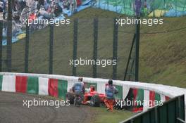 08.10.2005 Suzuka, Japan,  Michael Schumacher, GER, Ferrari crashed in the wet during the first practice session - October, Formula 1 World Championship, Rd 18, Japanese Grand Prix, Saturday Practice
