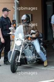 18.05.2005 Monte-Carlo, Monaco,  Michael Schumacher, GER, Ferrari, arrives in the Monaco paddock on a Harley Davidson - May, Formula 1 World Championship, Rd 6, Monaco Grand Prix, MON