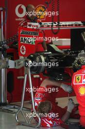 26.08.2005 Monza, Italy, Engineers working on the Ferrari of Michael Schumacher, GER - August, F1 testing, Autodromo Nazionale Monza, Italy