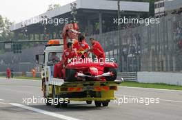 25.08.2005 Monza, Italy, Luca Badoer, ITA, Test Driver, Scuderia Ferrari, on a car transporter after a bursted left back Bridgestone tyre - August, F1 testing, Autodromo Nazionale Monza, Italy