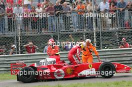 25.08.2005 Monza, Italy, Luca Badoer, ITA, Test Driver, Scuderia Ferrari, bursted left back Bridgestone tyre - August, F1 testing, Autodromo Nazionale Monza, Italy