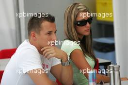 24.08.2005 Monza, Italy, Christian Klien, AUT, Red Bull Racing, with a girl in the hospitality - August, F1 testing, Autodromo Nazionale Monza, Italy