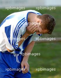 30.11.2005, Gland, Swizerland,  Soccer 3.Liga - FC Lusitano Gland - FC Echichens -  Michael Schumacher, GER, Scuderia Ferrari after a FOUL