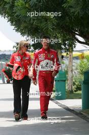 19.03.2005 Sepang, Malaysia, Michael Schumacher, GER, Ferrari and Sabine Kehm, Michael Schumacher's personal press officer - Saturday, March, Formula 1 World Championship, Rd 2, Malaysian Grand Prix, KUL, Kuala Lumpur