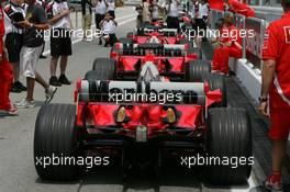 17.03.2005 Sepang, Malaysia, 3 Ferrari's await Scruteneering - Thursday, March, Formula 1 World Championship, Rd 2, Malaysian Grand Prix, KUL, Kuala Lumpur