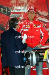 21.04.2005 Imola, San Marino, Jean Todt, FRA, Ferrari, Teamchief, General Manager, GES and Michael Schumacher, GER, Ferrari in the garage - Thursday, April, Formula 1 World Championship, Rd 4, San Marino Grand Prix, RSM