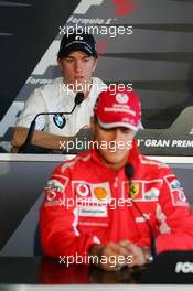 21.04.2005 Imola, San Marino, Press conference, Nick Heidfeld (GER), BMW Williams F1 Team, Portrait (rear) and Michael Schumacher (GER), Scuderia Ferrari Marlboro, Portrait (front) - Thursday, April, Formula 1 World Championship, Rd 4, San Marino Grand Prix, RSM