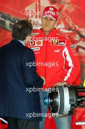 21.04.2005 Imola, San Marino, Jean Todt, FRA, Ferrari, Teamchief, General Manager, GES and Michael Schumacher, GER, Ferrari in the garage - Thursday, April, Formula 1 World Championship, Rd 4, San Marino Grand Prix, RSM