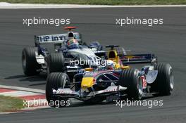 21.08.2005 Istanbul, Turkey, Christian Klien, AUT, Red Bull Racing, RB1, Action, Track leads Mark Webber, AUS, BMW WilliamsF1 Team, FW27, Action, Track - August, Formula 1 World Championship, Rd 14, Turkish Grand Prix, Istanbul Park, Turkey, Race