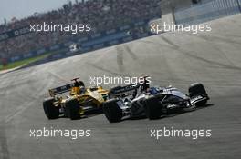 21.08.2005 Istanbul, Turkey, Robert Doornbos, NED, Minardi Cosworth, Action, Track leads Tiago Monteiro, PRT, Jordan, EJ15, Action, Track - August, Formula 1 World Championship, Rd 14, Turkish Grand Prix, Istanbul Park, Turkey, Race
