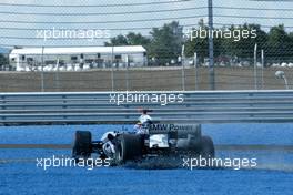 21.08.2005 Istanbul, Turkey, Mark Webber, AUS, BMW WilliamsF1 Team, suffers a tyres failure - August, Formula 1 World Championship, Rd 14, Turkish Grand Prix, Istanbul Park, Turkey, Race