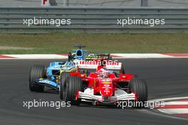 21.08.2005 Istanbul, Turkey, Rubens Barrichello, BRA, Ferrari, Giancarlo Fisichella, ITA, Mild Seven Renault F1 Team - August, Formula 1 World Championship, Rd 14, Turkish Grand Prix, Istanbul Park, Turkey, Race