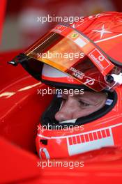 20.08.2005 Istanbul, Turkey, Michael Schumacher, GER, Ferrari with a clip on his visor to lock it into place - August, Formula 1 World Championship, Rd 14, Turkish Grand Prix, Istanbul Park, Turkey, Practice