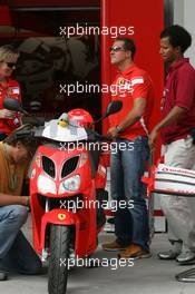 18.08.2005 Istanbul, Turkey, Michael Schumacher, GER, Ferrari views the circuit on a moped - August, Formula 1 World Championship, Rd 14, Turkish Grand Prix, Istanbul Park, Turkey